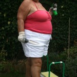 Granny loves getting naked in her garden