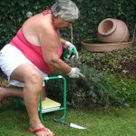 Granny loves getting naked in her garden